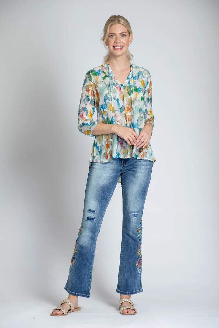 APNY Desert Dyes Watercolor Print V-Neck With Tassel Pose